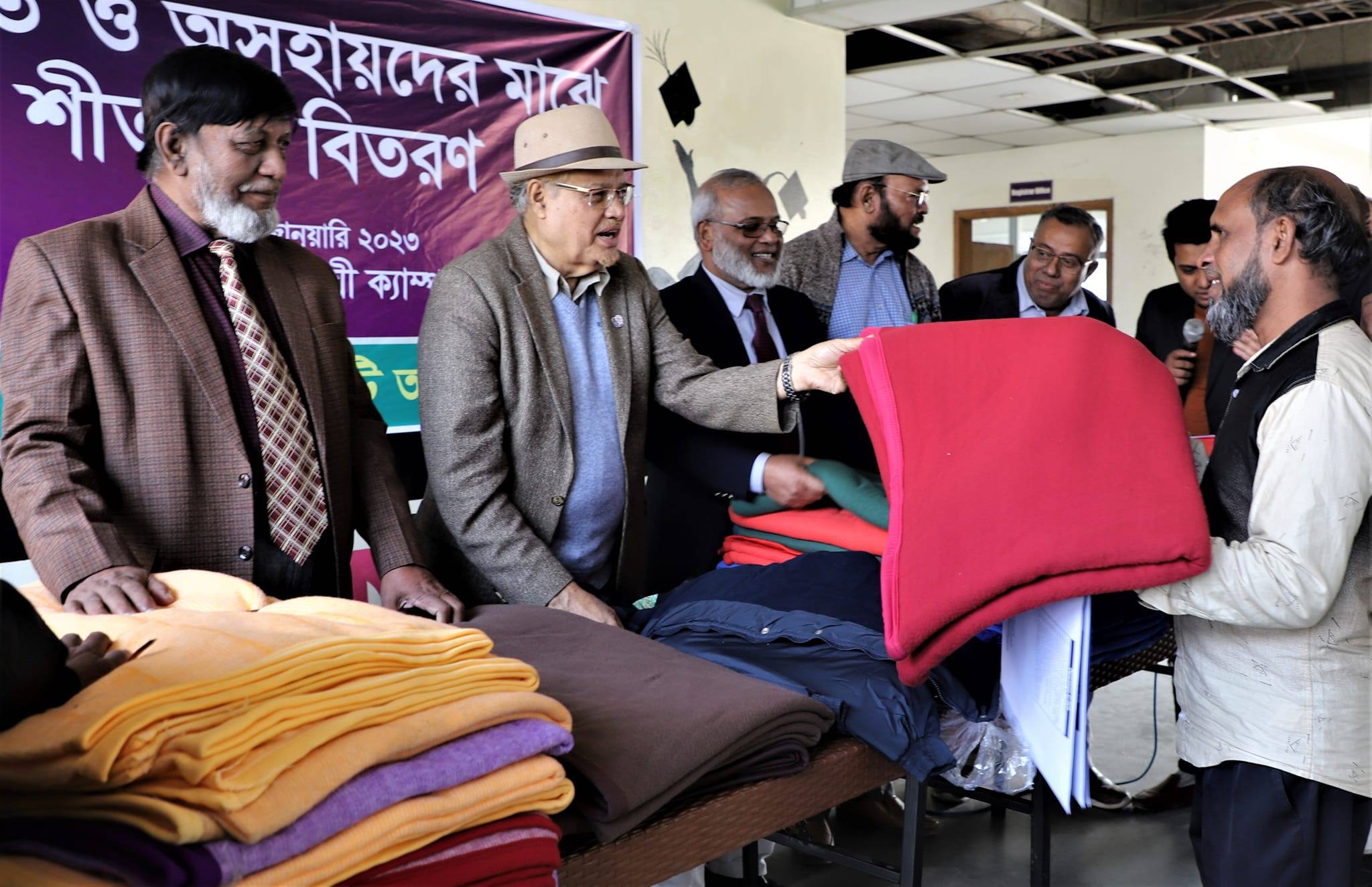 Distribution of winter clothes to the cold and helpless people
